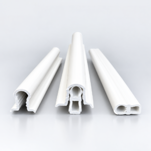 Two PVC greenhouse profiles shown apart before fitting. PlasCity custom plastic profiles manufacturer, Lahore, Pakistan